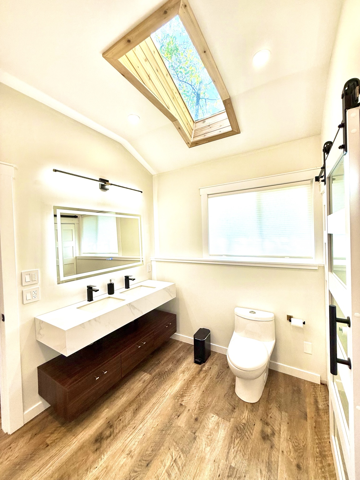 The double vanity and skylight in the Ravens Nest bathroom